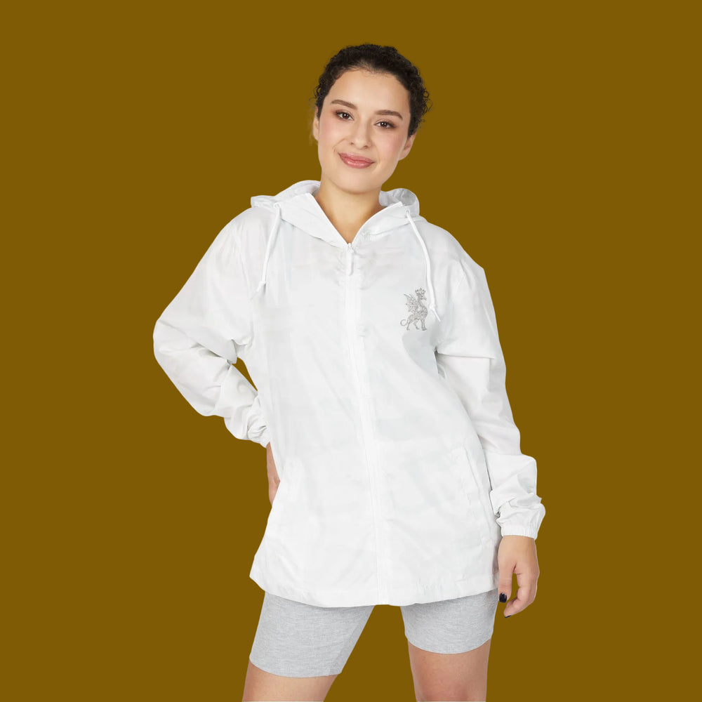 Woman wearing a white hoodie with 'Kari' branding on a white background
